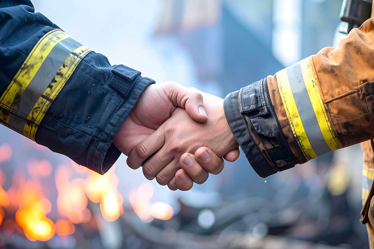 Firefighters shaking hands